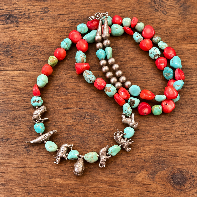 Vintage Zuni coral and turquoise with sterling animal charms 28” long