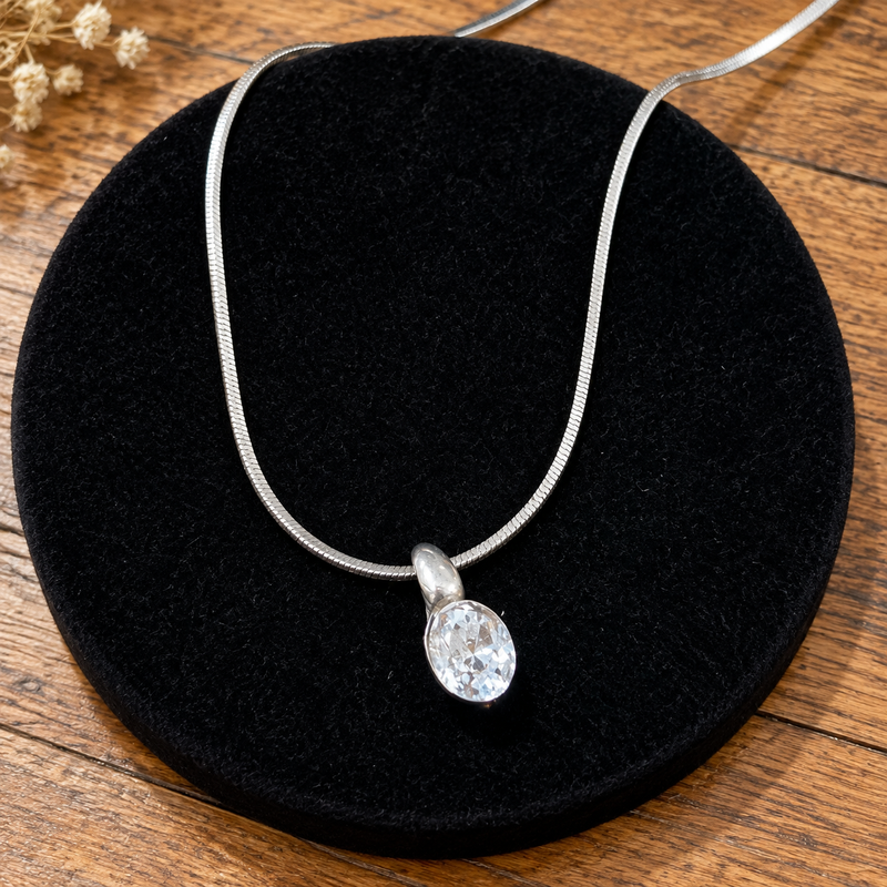 Sterling silver faux diamond pendant on a 20”  Sterling silver chain
