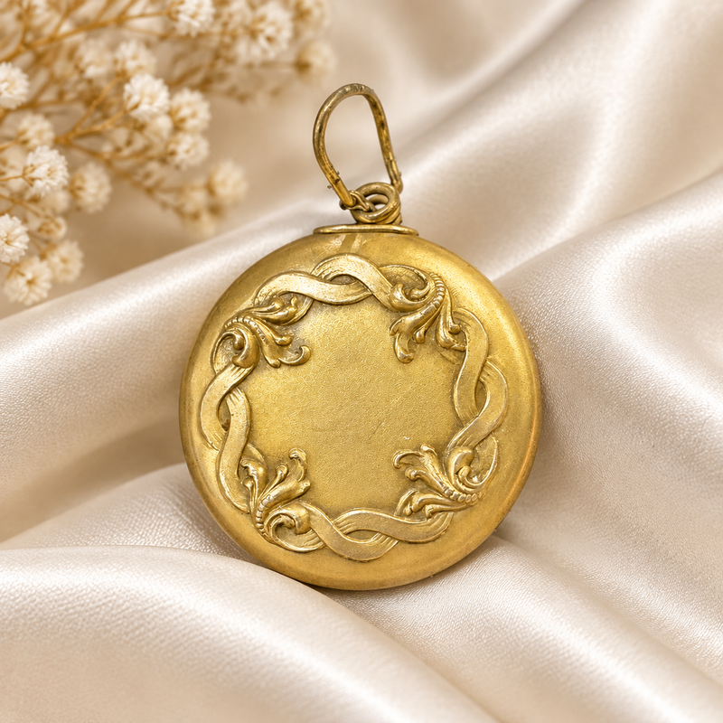 Victorian Gold Filled Key chain holder with a scrolling floral pattern 1” diameter