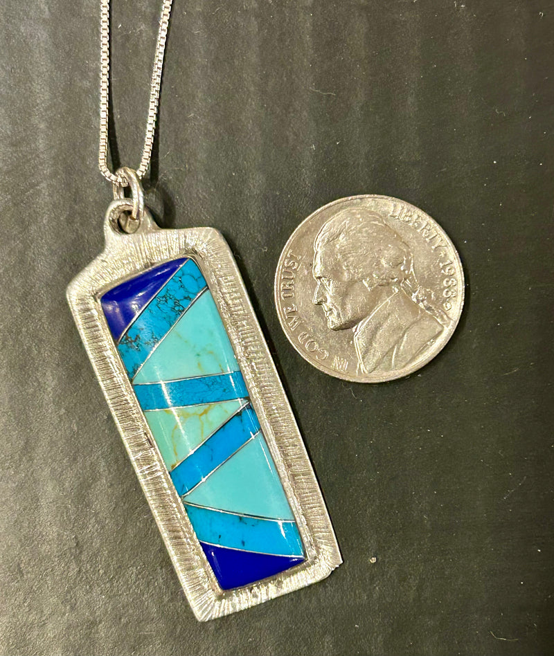 Sterling silver turquoise and lapis inlay pendant on am 18 “ sterling silver chain