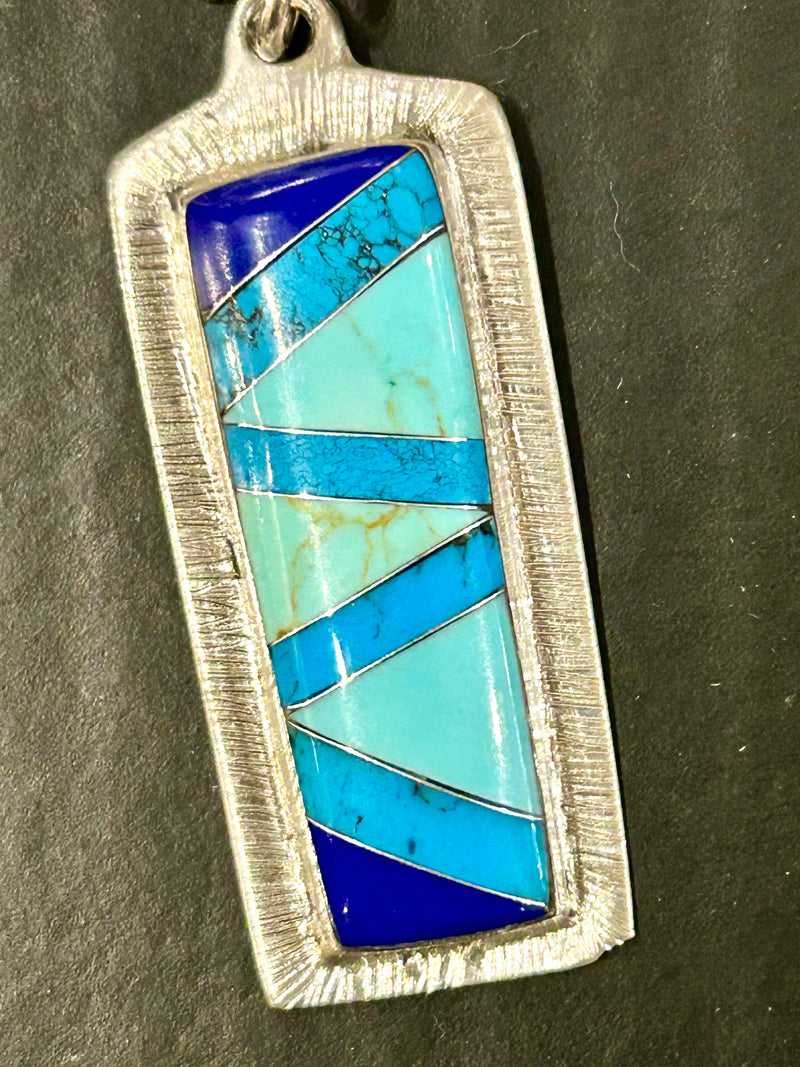 Sterling silver turquoise and lapis inlay pendant on am 18 “ sterling silver chain