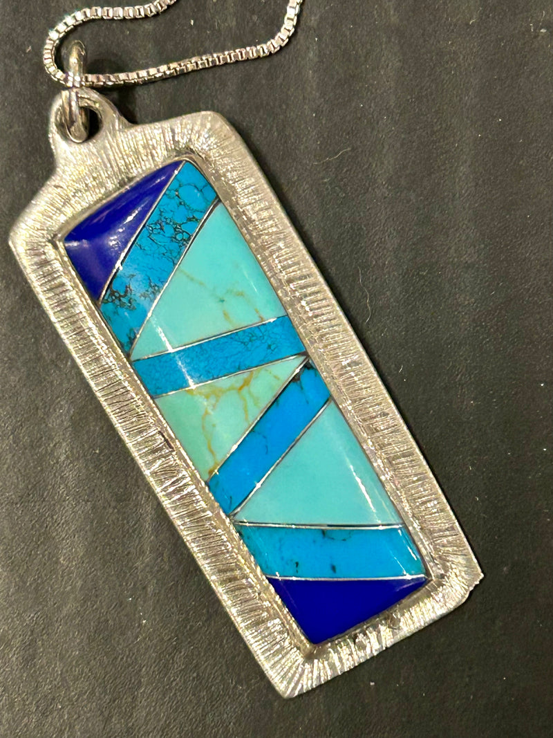 Sterling silver turquoise and lapis inlay pendant on am 18 “ sterling silver chain