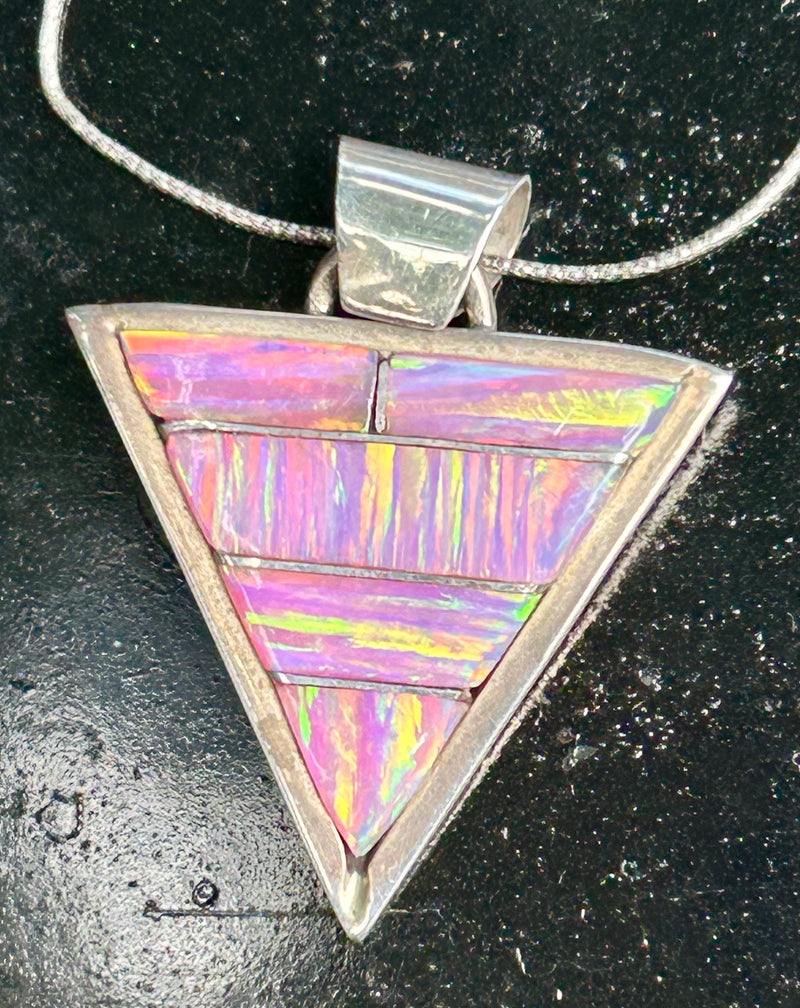 Sterling silver lab opal pendant on a 16” sterling silver chain