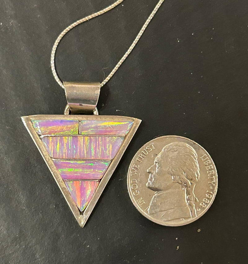 Sterling silver lab opal pendant on a 16” sterling silver chain
