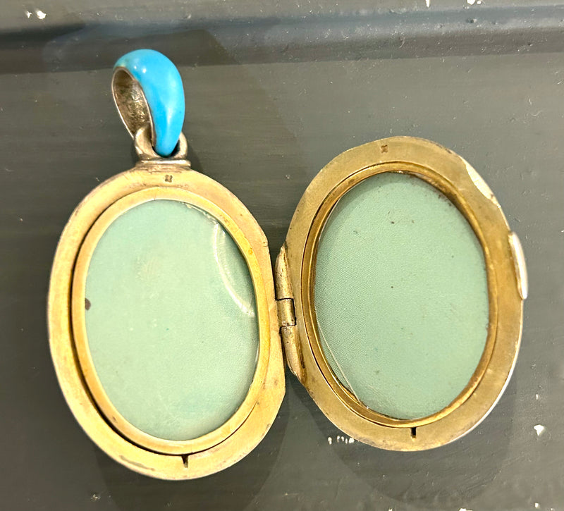 Victorian Robin’s egg blue locket with seed pearls utilzed to create a interlocking design 1 1/2” x 2 1/4” sterling silver shell