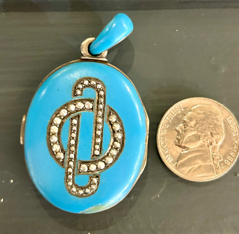 Victorian Robin’s egg blue locket with seed pearls utilzed to create a interlocking design 1 1/2” x 2 1/4” sterling silver shell