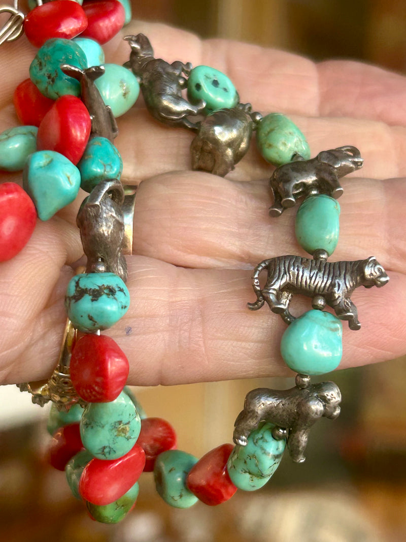 Vintage Zuni coral and turquoise with sterling animal charms 28” long