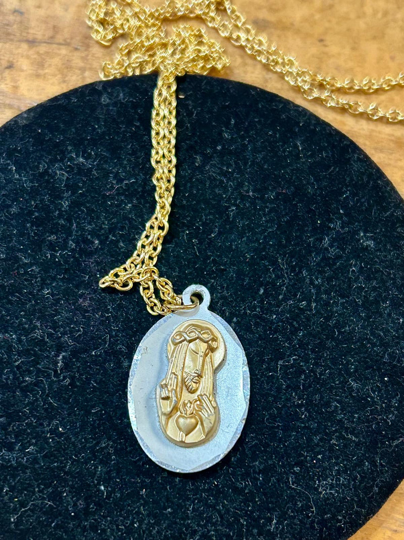 Religious metal with Gold tone chain