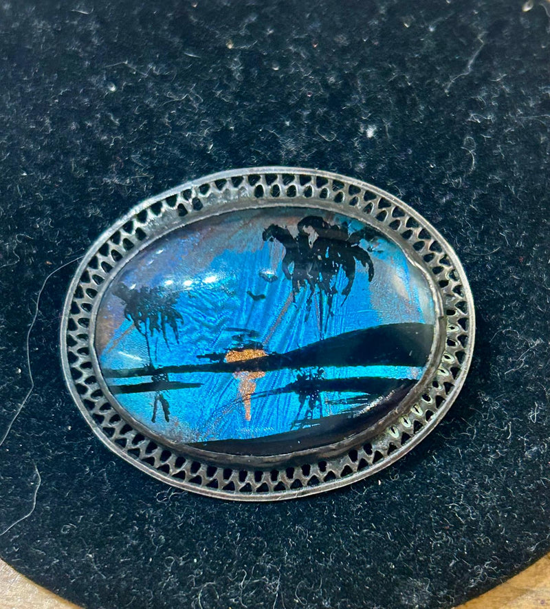 Vintage Sterling Silver Filigree hand painted tropical scenery on a butterfly wing brooch