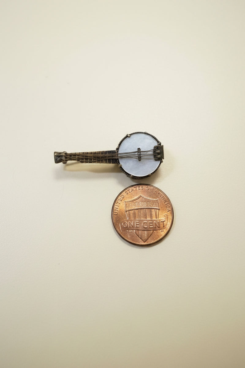 Vintage banjo pin with mother of pearl