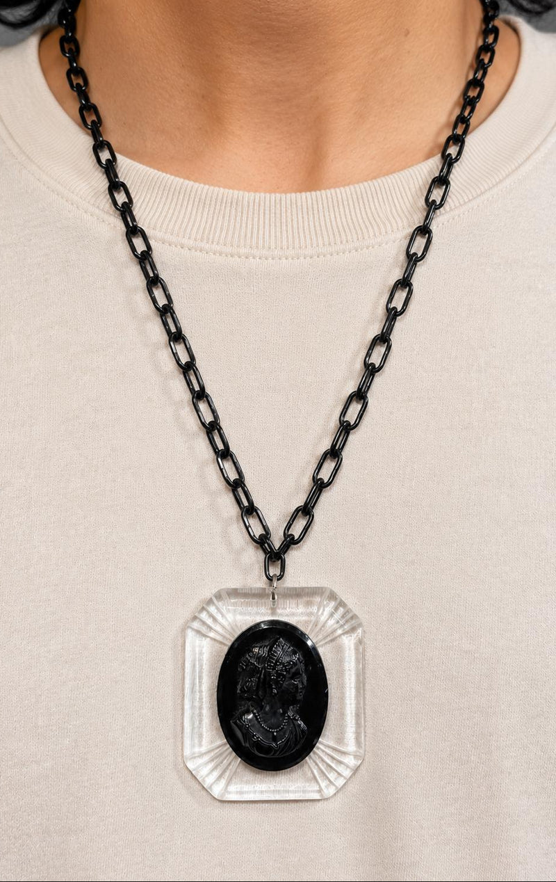 Vintage lucite cameo necklace 2 1/4” x 2 1/2” on a lucite link chain 22”